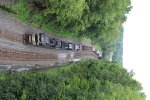 An NS freight slowly rolls up the grade at Summit Cut